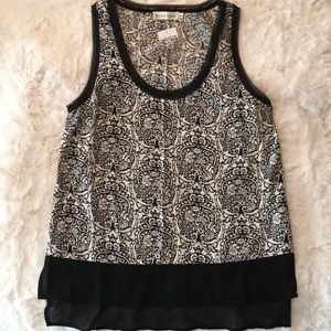 Sleeveless NWT top. Size Lg